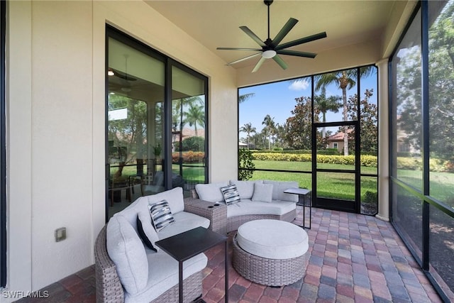 sunroom / solarium with ceiling fan