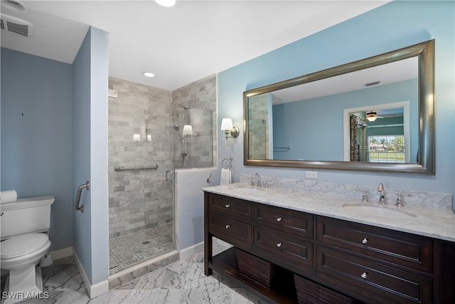 bathroom with walk in shower, ceiling fan, vanity, and toilet