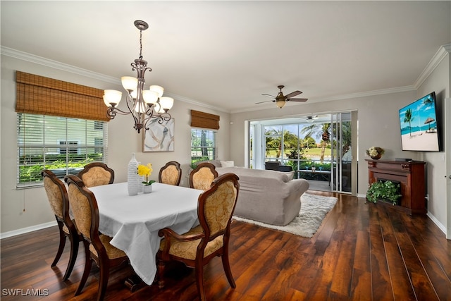 dining space with ceiling fan with notable chandelier, dark hardwood / wood-style flooring, and crown molding