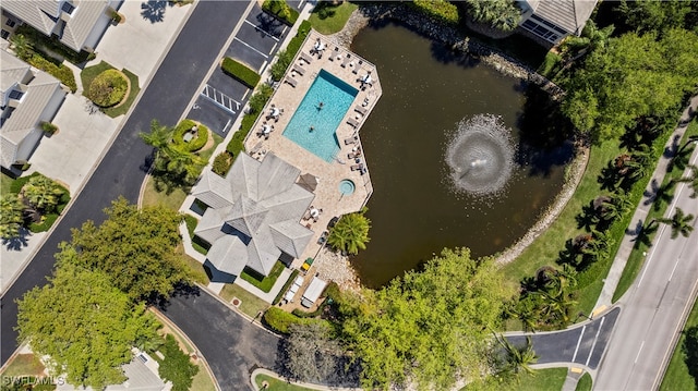 birds eye view of property featuring a water view