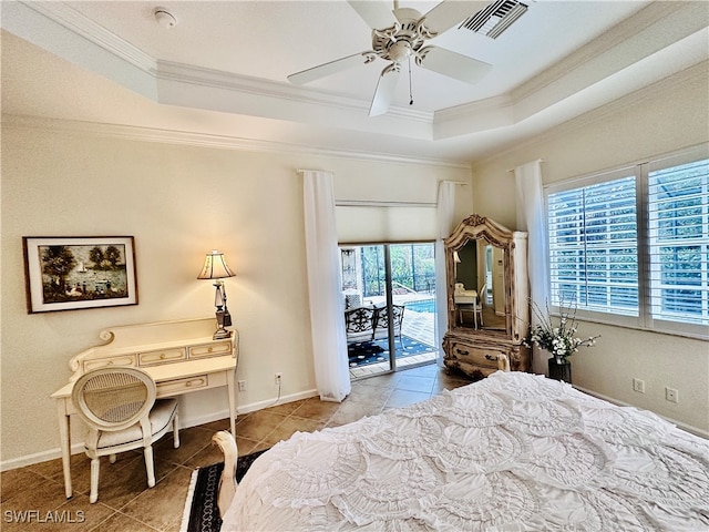 tiled bedroom featuring ceiling fan, crown molding, access to exterior, and a tray ceiling