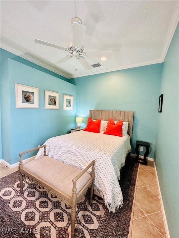 tiled bedroom with ceiling fan and crown molding