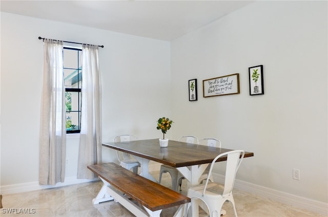 view of tiled dining room