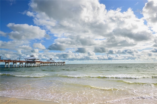 water view featuring a boat dock and a view of the beach