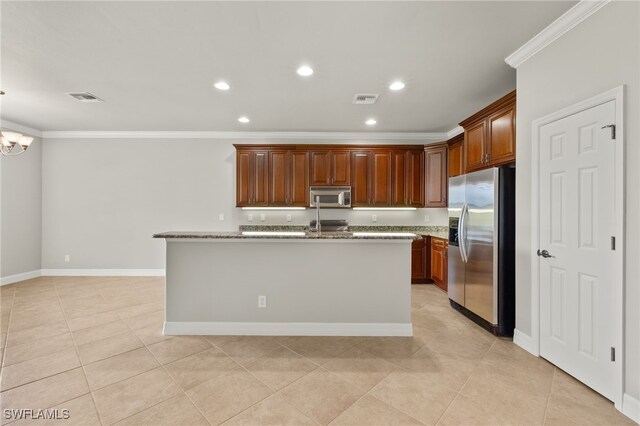 kitchen with light tile patterned flooring, a kitchen island with sink, crown molding, and appliances with stainless steel finishes