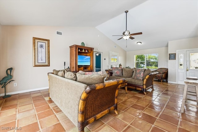 tiled living room featuring lofted ceiling and ceiling fan