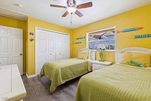 bedroom with a closet, ceiling fan, and dark hardwood / wood-style floors