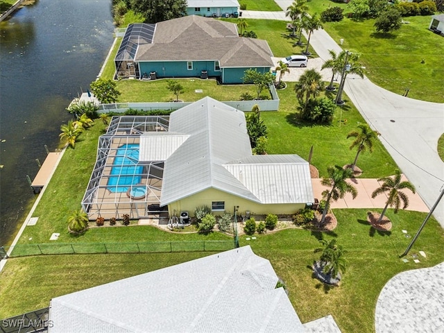 drone / aerial view featuring a water view