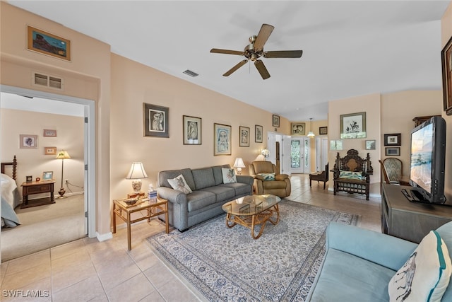 living room featuring ceiling fan and light colored carpet