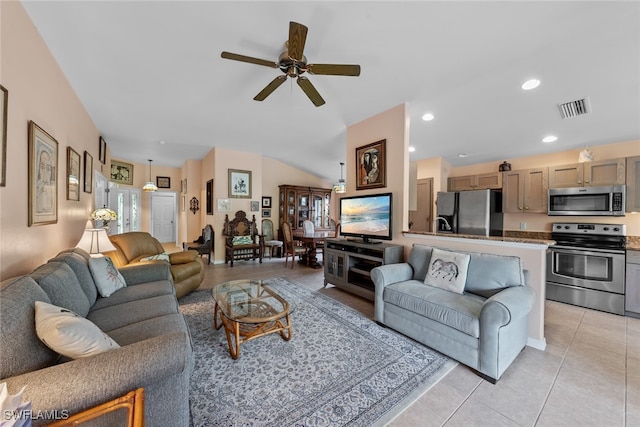 living room featuring ceiling fan and light tile patterned floors