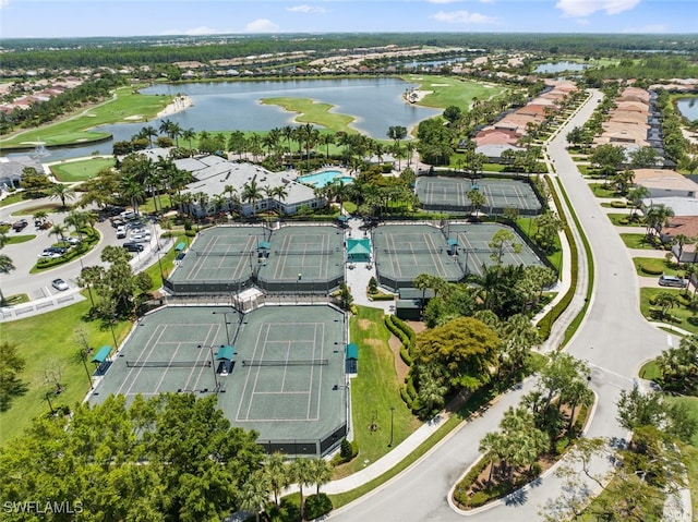 birds eye view of property featuring a water view