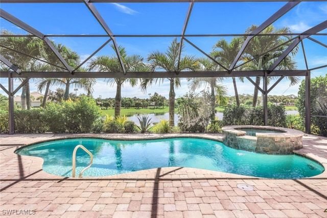 view of pool featuring glass enclosure, an in ground hot tub, and a patio area