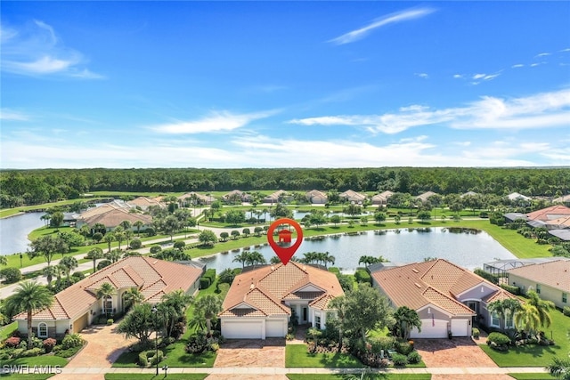 drone / aerial view featuring a water view