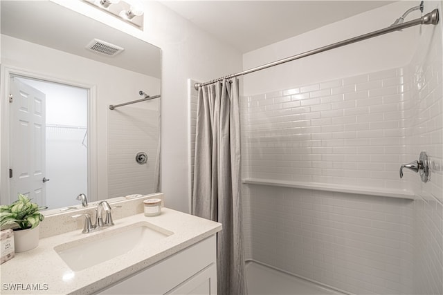 bathroom with vanity and shower / tub combo