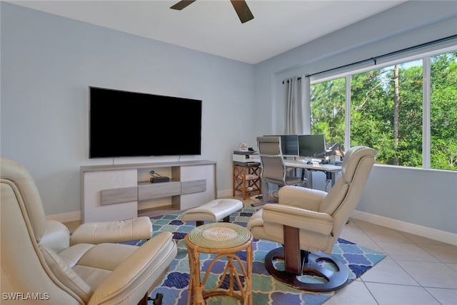 living room featuring ceiling fan and light tile patterned floors