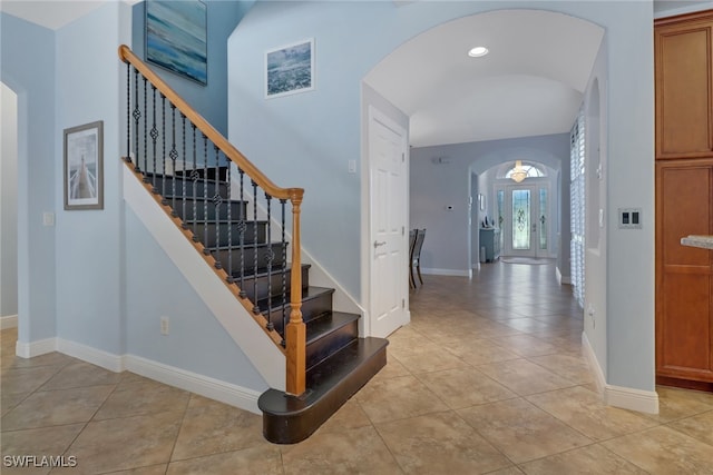 entryway featuring light tile patterned floors