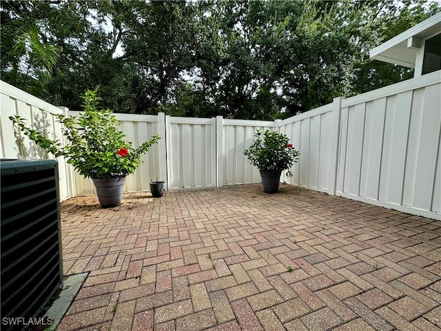 view of patio featuring cooling unit