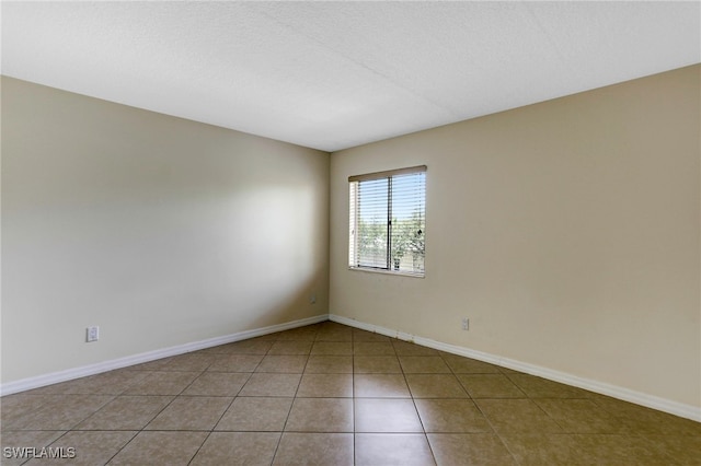 view of tiled empty room