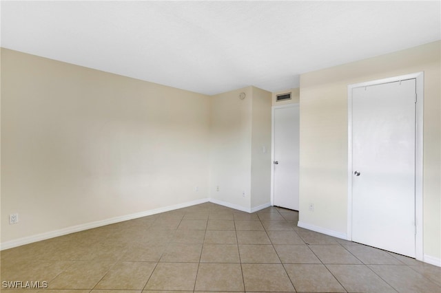 view of tiled spare room