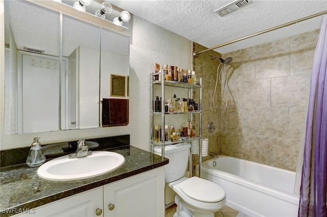 full bathroom featuring vanity, toilet, shower / bath combination with curtain, and a textured ceiling