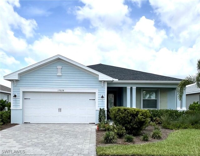 single story home with a garage