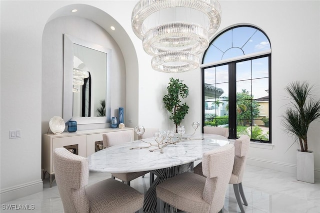 dining room with a notable chandelier