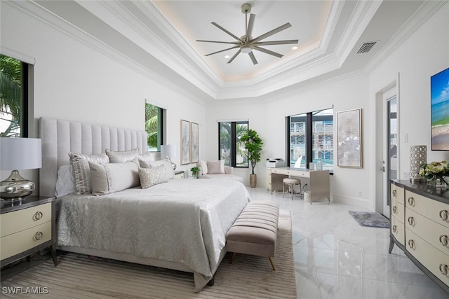 bedroom with ornamental molding, a raised ceiling, and ceiling fan