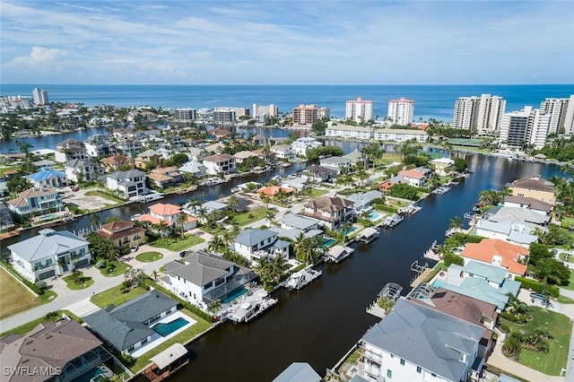 bird's eye view with a water view