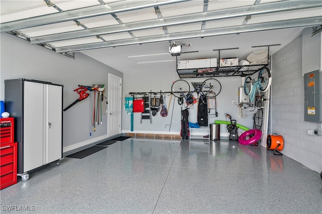 garage with electric panel and a garage door opener