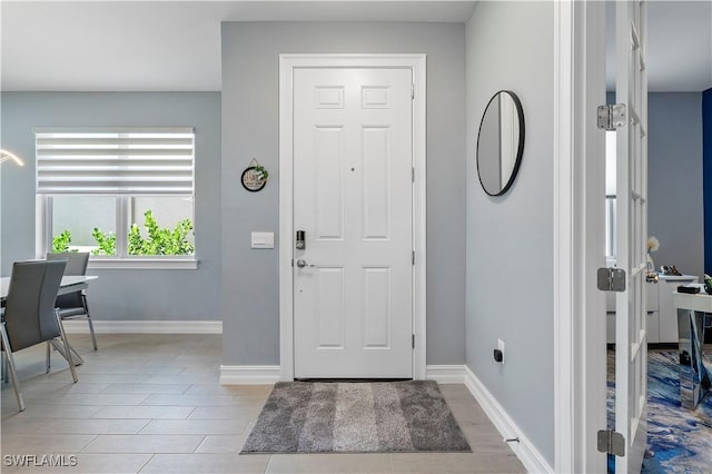 entrance foyer with baseboards