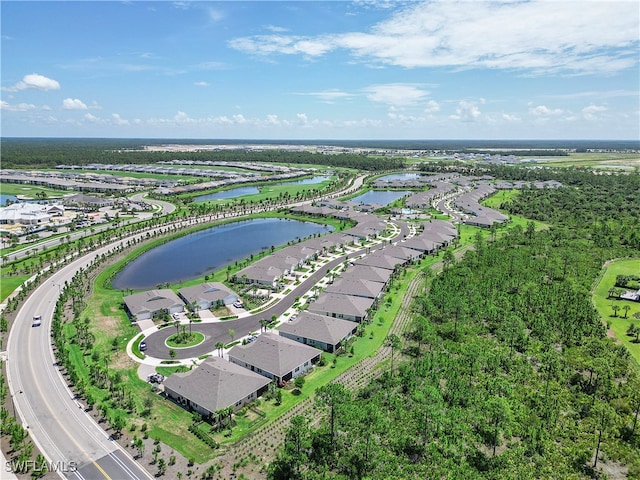 drone / aerial view with a water view