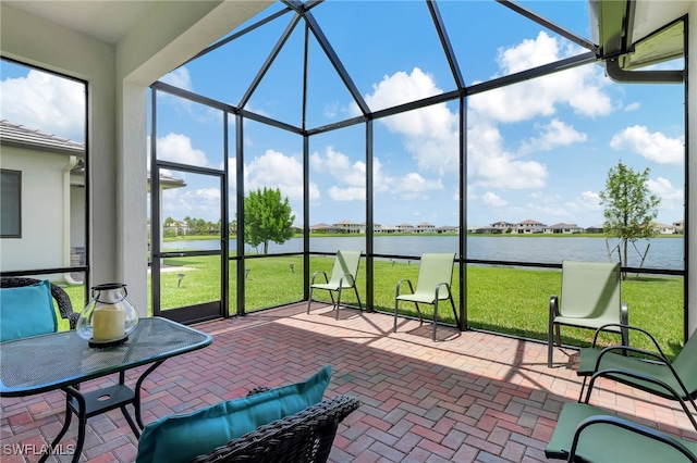 sunroom with a water view