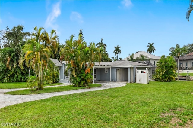 view of front of property with a garage and a front yard