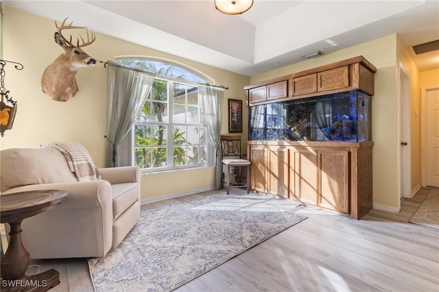 sitting room featuring light hardwood / wood-style floors