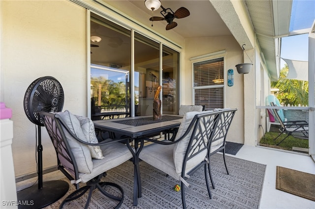 view of patio / terrace featuring ceiling fan