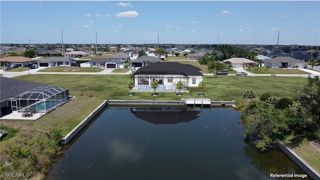 drone / aerial view featuring a water view