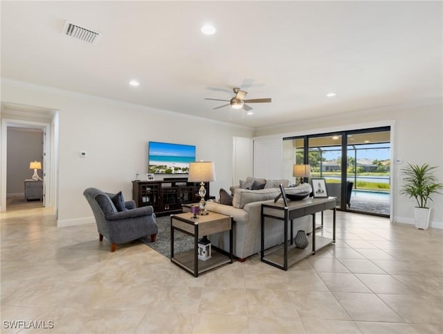 tiled living room featuring ornamental molding and ceiling fan