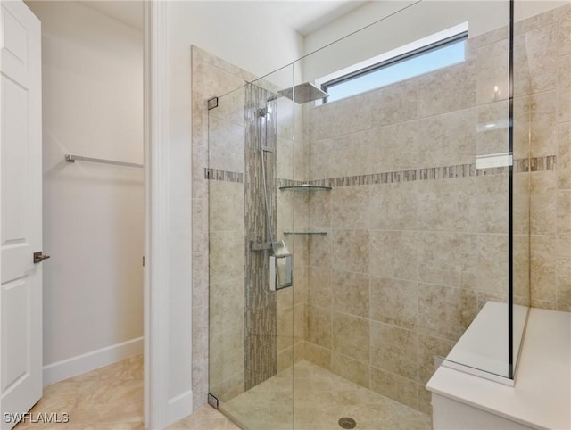 bathroom with a shower with shower door