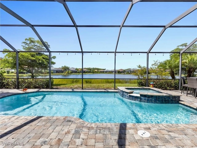 view of pool with a lanai, an in ground hot tub, a patio, and a water view