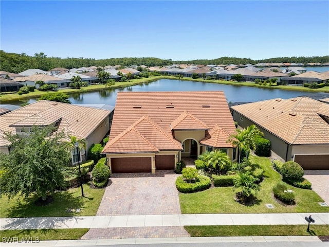 drone / aerial view featuring a water view