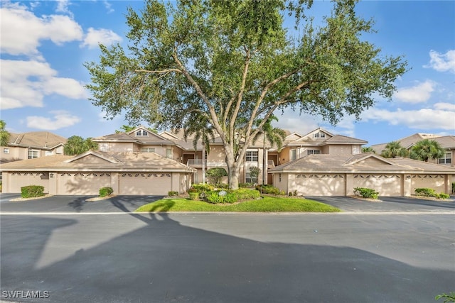 view of property featuring a residential view and stucco siding