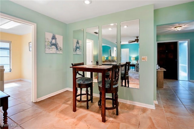 dining area featuring ceiling fan