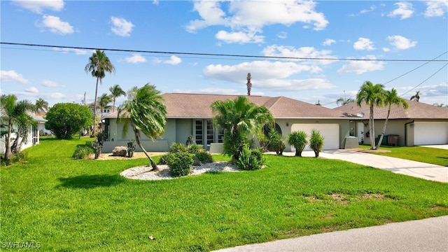 single story home with a garage and a front yard