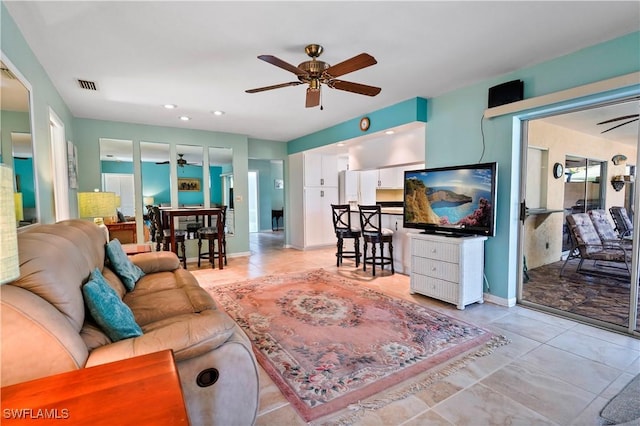 living room featuring ceiling fan