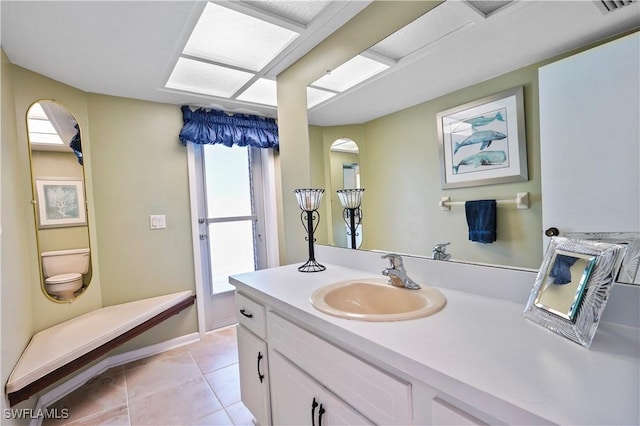 bathroom featuring tile patterned floors and vanity