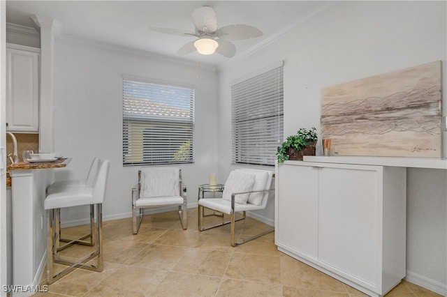 sitting room featuring light tile patterned floors, crown molding, and ceiling fan