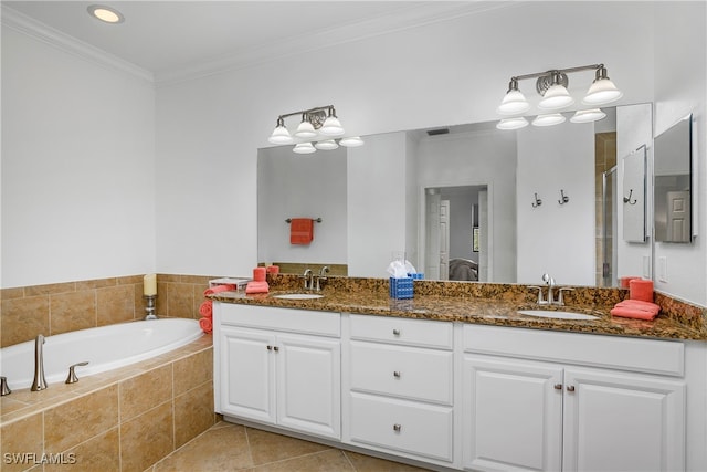 bathroom with tile patterned flooring, crown molding, vanity, and plus walk in shower