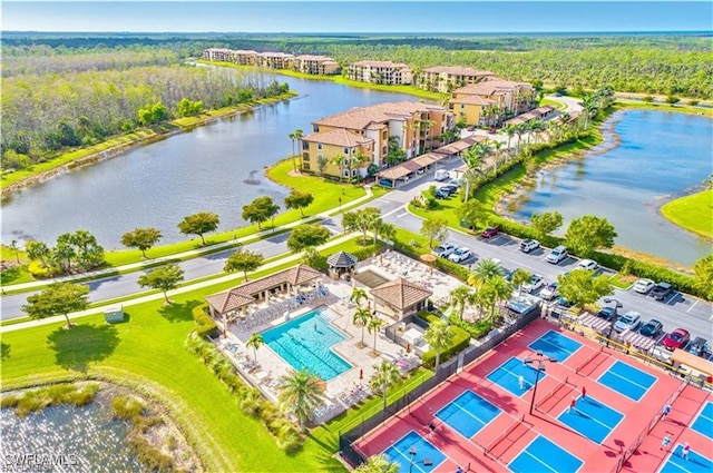 bird's eye view with a water view