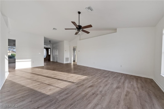 unfurnished living room with light hardwood / wood-style flooring, high vaulted ceiling, and ceiling fan