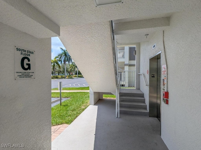 view of patio / terrace featuring elevator